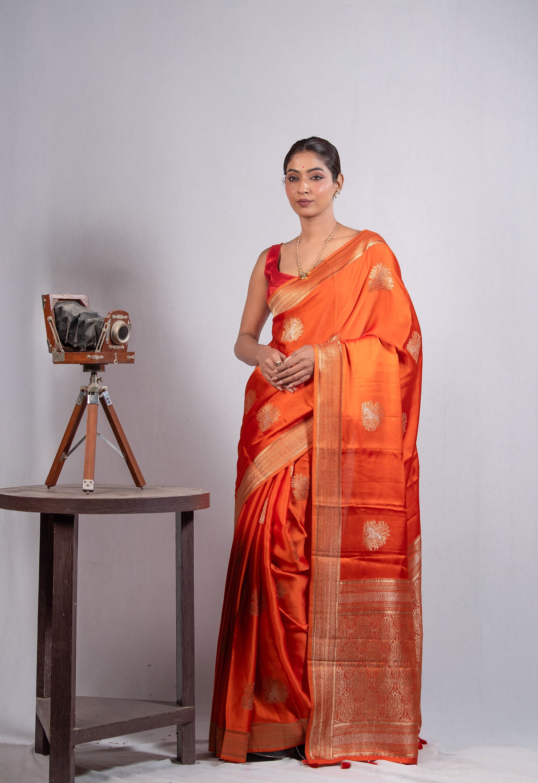 Pure Banarasi Silk Saree in Radiant Orange with Zari Buta & Traditional Border